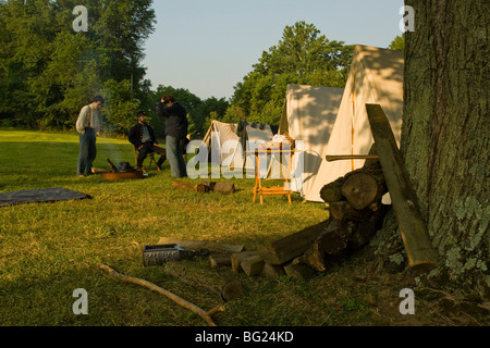 Reenactors portray Union soldiers in camp. Stock Photo