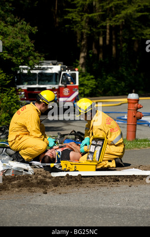 firemen and medics rescue training Stock Photo