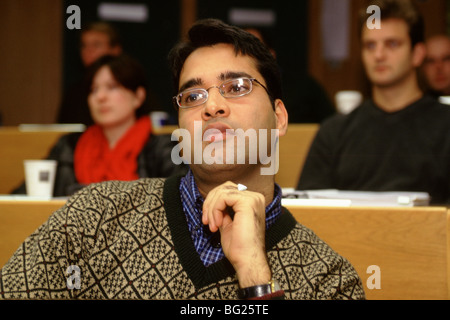 Students listen during a lecture at the London Business School, London, England Stock Photo