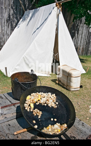 Typical pioneer meal of corn fried in bear grease at Fort William Historical Park, Thunder Bay, Ont. Stock Photo