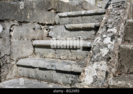 Old and weathered stone steps at Sallians Cemetery Stock Photo