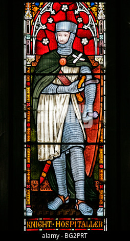 Detail from the west stained glass window by Frederick Preedy depicting the Knights Hospitaller, Church of St Andrew, Temple Grafton, Warwickshire Stock Photo