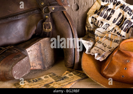 Boots and hat from wild west wanted outlaw Stock Photo