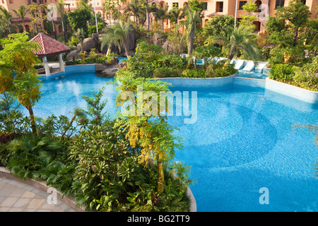 Swimming pool and trees in the garden in a new Chinese residential district Stock Photo