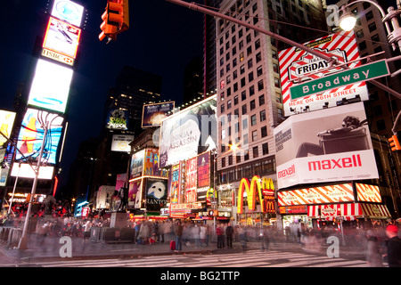 Night scene of Broadway at Times Square in Manhattan (New York City) with all the lit up billboards and advertisements. Stock Photo