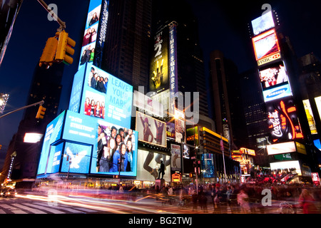 Night scene of Broadway at Times Square in Manhattan (New York City) with all the lit up billboards and advertisements. Stock Photo