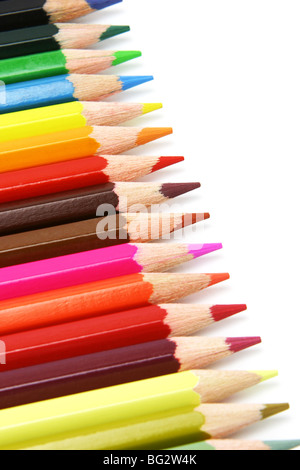 Assortment of color pencils arranged in a row Stock Photo