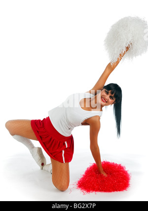 Young lady cheerleader posing in the studio, isolated on white Stock Photo