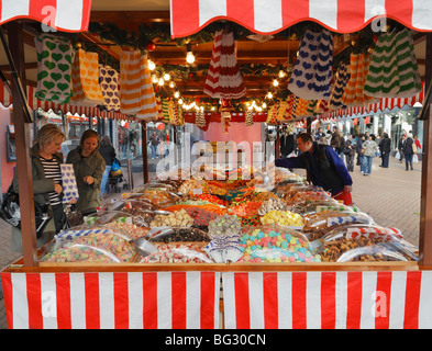Christmas street market sweet stall. Stock Photo