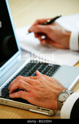 Bussinessman working on his laptop. Stock Photo
