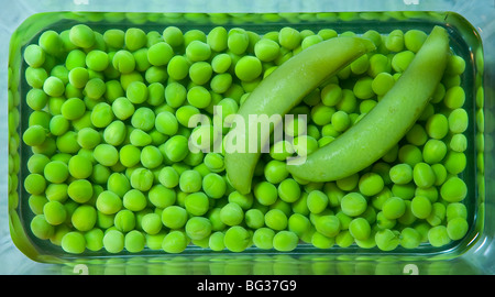 Peas In Pod In Dish Stock Photo