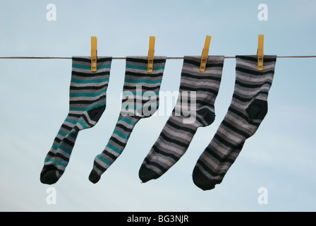 socks on the clothesline Stock Photo