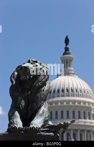 Lion Statue in front of the dome of the U.S. Capitol Building, Washington D.C., United States of America, North America Stock Photo