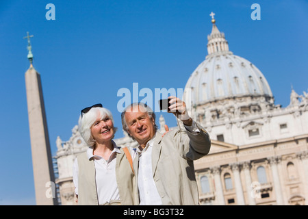 Senior tourists sightseeing in St. Peters Square, Rome, Lazio, Italy, Europe Stock Photo