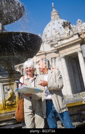 Senior tourists sightseeing in St. Peters Square, Rome, Lazio, Italy, Europe Stock Photo