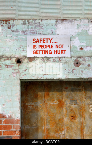 Workplace safety sign on old wall at historic Toronto Wychwood Barns TTC site Stock Photo