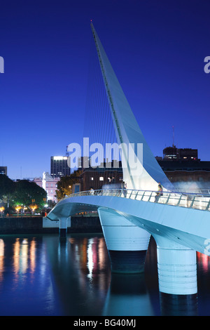 Argentina, Buenos Aires, Puerto Madero, Puente de la Mujer bridge, dusk Stock Photo