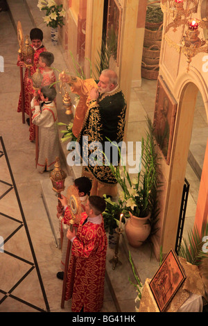 Israel, Nazareth, Abouna Emile Shoufani at the Greek Catholic Church on Palm Sunday Stock Photo