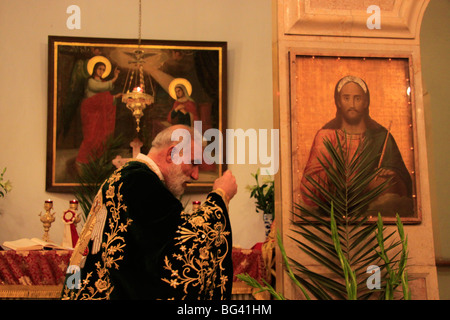 Israel, Nazareth, Abouna Emile Shoufani at the Greek Catholic Church on Palm Sunday Stock Photo