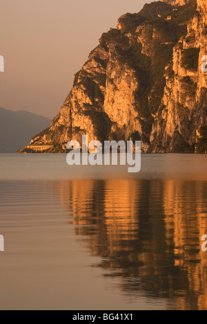 Italy, Trentino-Alto Adige, Lake District, Lake Garda, Riva del Garda, lakeside mountains at La Punta Stock Photo