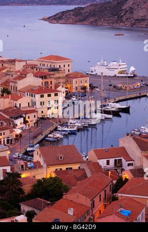 Italy, Sardinia, Northern Sardinia, Isola Maddalena, La Maddalena, aerial port view from the hills, dusk Stock Photo