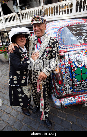 England, London, Pearly King and Queen and Decorated London Taxi Stock Photo
