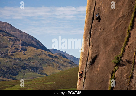 Rock climbers climbing the monolith of Karimbony, Tsaranoro Massif, Andringitra National Park, Southern Madagascar Stock Photo