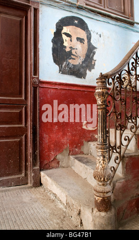Che Guevara mural in the old building/ entrance to La Guarida restaurant, Havana, Cuba, Caribbean Stock Photo