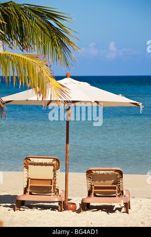 Honduras, Bay Islands, Roatan, West Bay, Sun loungers on beach Stock Photo