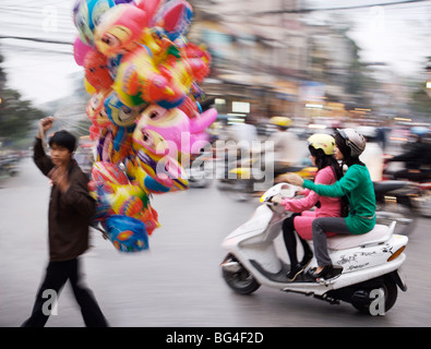 Man selling Balloons, Hanoi, Vietnam, Indochina, Southeast Asia, Asia Stock Photo