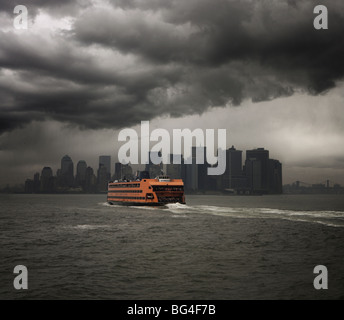 Staten Island ferry sailing towards Manhattan, New York, United States of America, North America Stock Photo