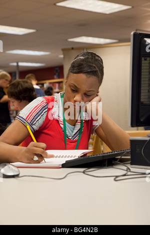 St. Clair Shores, Michigan - A student studies in the media center (library) at Lake Shore High School. Stock Photo