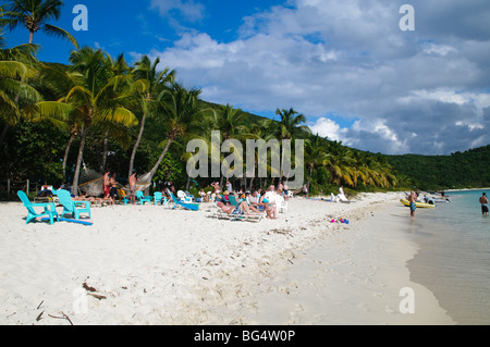 JOST VAN DYKE, British Virgin Islands — The Soggy Dollar Bar, located on the pristine White Bay of Jost Van Dyke, is an iconic beach bar famous for its laid-back vibe and the invention of the Painkiller cocktail. Visitors often swim ashore from their boats, adding to the bar's unique and relaxed atmosphere. Stock Photo