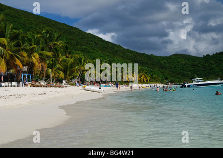 JOST VAN DYKE, British Virgin Islands — The Soggy Dollar Bar, located on the pristine White Bay of Jost Van Dyke, is an iconic beach bar famous for its laid-back vibe and the invention of the Painkiller cocktail. Visitors often swim ashore from their boats, adding to the bar's unique and relaxed atmosphere. Stock Photo