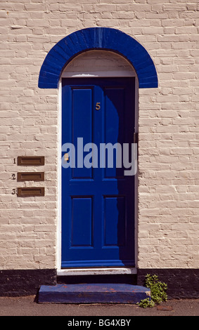 A blue front door of a house in Kent, England Stock Photo