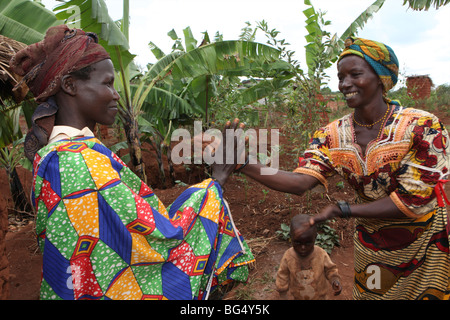 During the war in Burundi half a million people fled to Tanzania.Now they return ands rebuild their homes Stock Photo