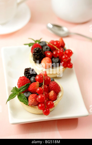 Berries tartlets. Recipe available. Stock Photo