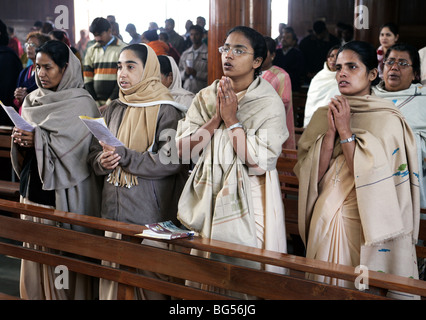catholic nuns at sunday mass service in the roman catholic cathedral Saint Joseph's in Lucknow, Uttar Pradesh, India Stock Photo