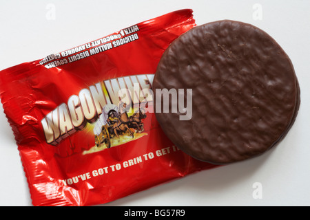 Wagon Wheels biscuit - individual packet of original flavoured Wagon Wheels biscuits set on white background - you've got to grin to get it in Stock Photo