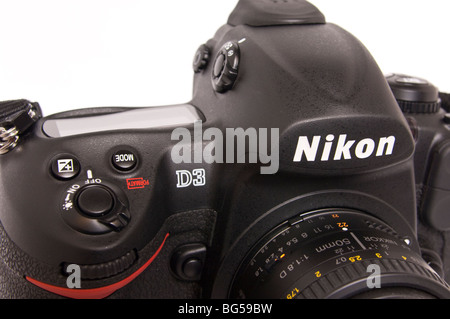 A Nikon D3 digital DSLR full frame (FX) flagship model professional camera with 50mm lens attatched on a white background Stock Photo