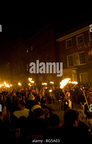 Lewes bonfire celebrations. A torchlight procession through the streets of Lewes in East Sussex, UK. Stock Photo