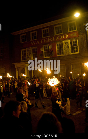 Lewes bonfire celebrations. A torchlight procession through the streets of Lewes in East Sussex, UK. Stock Photo