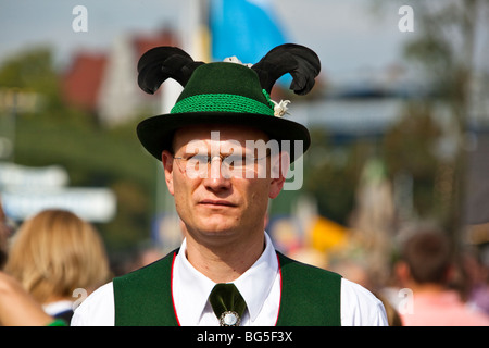 Senior man wearing funny hat at the Oktoberfest, Munich Germany Stock Photo
