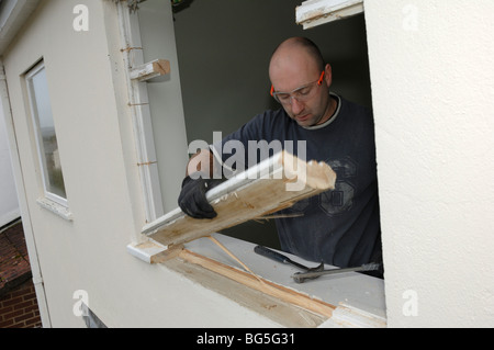 Removing old window frame before Installing new double glazed windows ...
