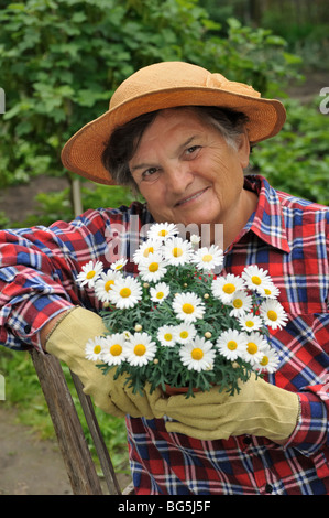 Senior woman gardening Stock Photo