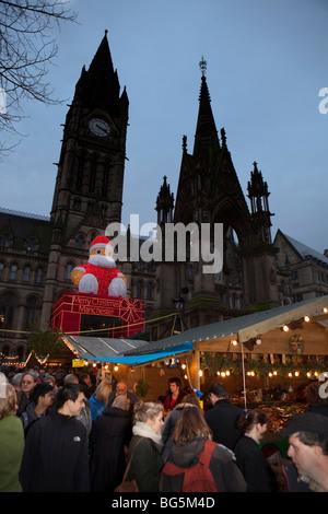UK, England, Manchester, Albert Square, crowds in Continental market outsideTown Hall Stock Photo