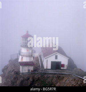 CALIFORNIA - Point Reyes Lighthouse on Point Reyes on a foggy morning at Point Reyes National Seashore. Stock Photo