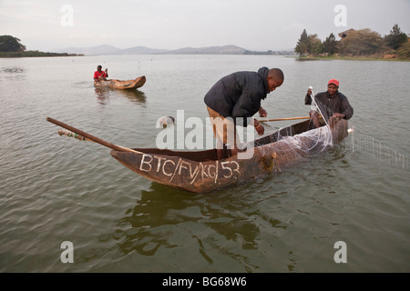 Fishermen fish in the waters of Lake Babati in Central Tanzania. Stock Photo