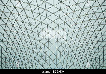 Interior view of the Great Court in The British Museum, London. A Modern highly architectural glass lattice roof covers the area Stock Photo