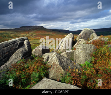 Looking towards the Iron Age hill fort of Carl Wark from Burbage Rocks on Hathersage Moor, Peak District, South Yorkshire. Stock Photo